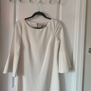 White bell sleeve dress (lined) with gold zipper detail